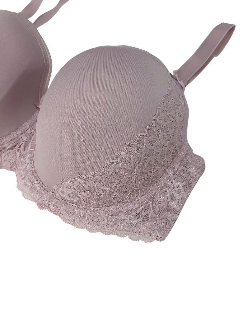 Elegancki top bieliźniany pudrowy róż z ozdobną kokardką.